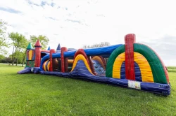 electric rush castle obstacle course side 1778279169 38ft Electric Rush Obstacle attached to 13x13 bounce house