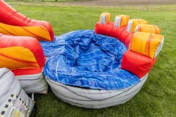 fiery fortress bounce house pool 1778249573 The Fiery Fortress Wet Bounce house with slide