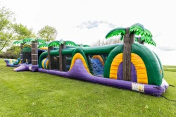 tropical bounce house obstacle back 1778275575 79ft long Tropical Oasis obstacle and bounce house with double slide