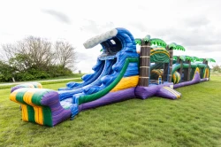 tropical bounce house obstacle course 1778275574 79ft long Tropical Oasis obstacle and bounce house with double slide