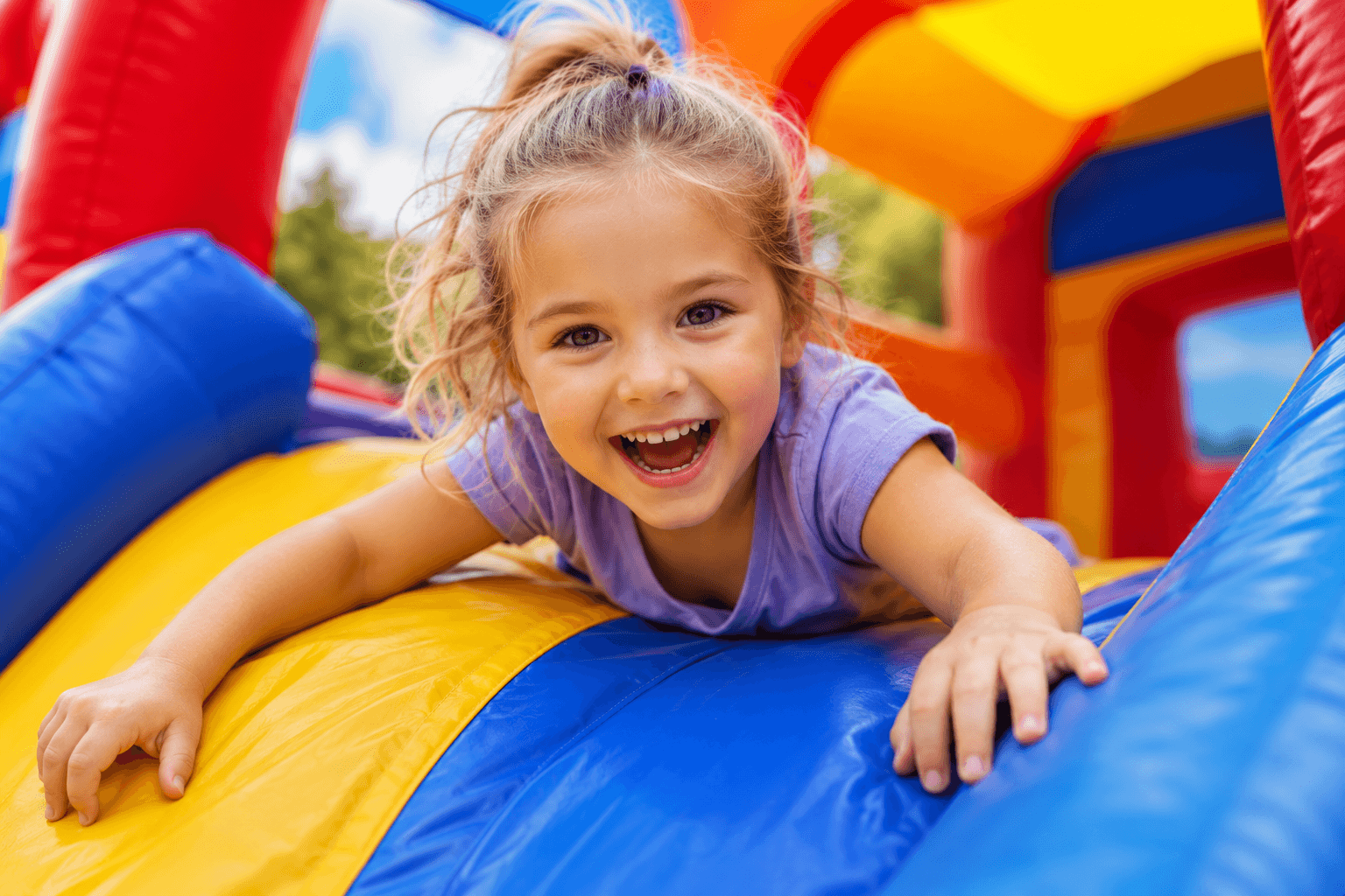 Bounce house and slide rentals from Bouncy B's set up for a party in Cedar Lake, Indiana